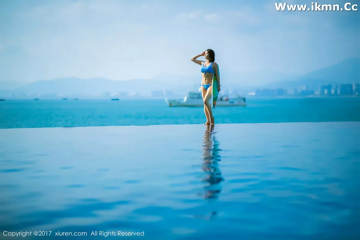 2kmn.vip_[XiuRen秀人网]No.858_嫩模廿十海南三亚旅拍蓝天白云海边性感比基尼写真45P