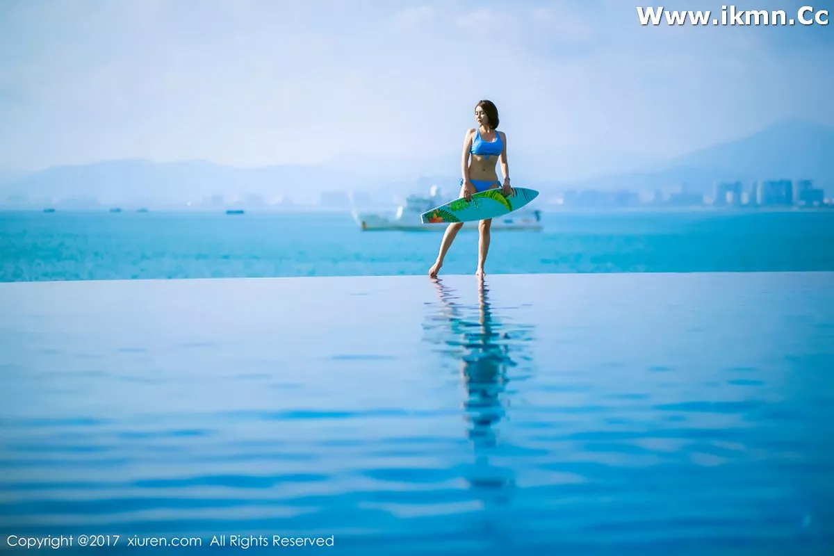 2kmn.vip_[XiuRen秀人网]No.858_嫩模廿十海南三亚旅拍蓝天白云海边性感比基尼写真45P